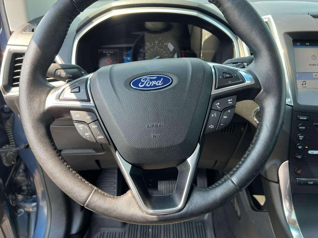 Used 2019 Blue Metallic Ford Titanium image 9