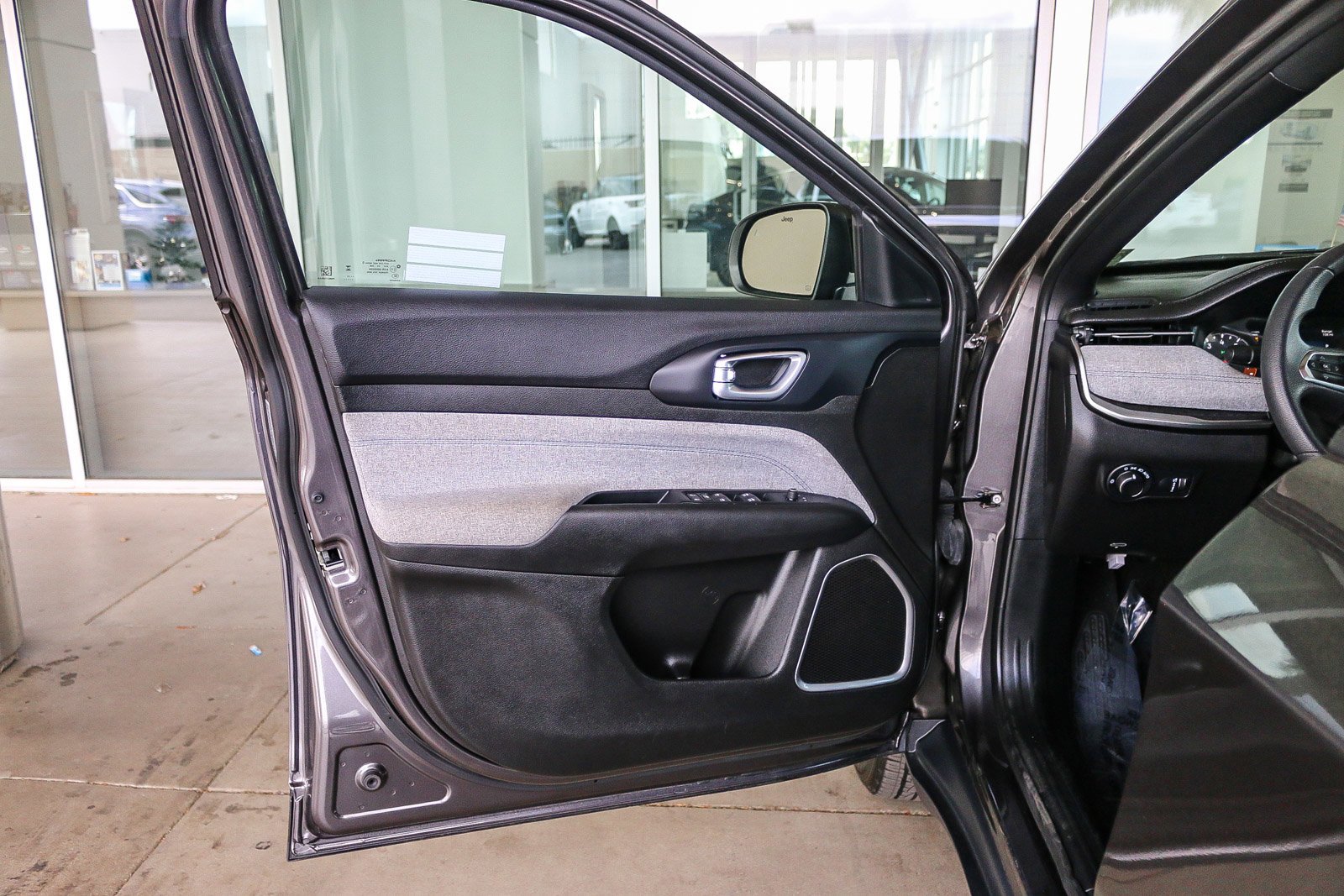 Used 2023 Granite Crystal Metallic Clearcoat Jeep Sport image 23