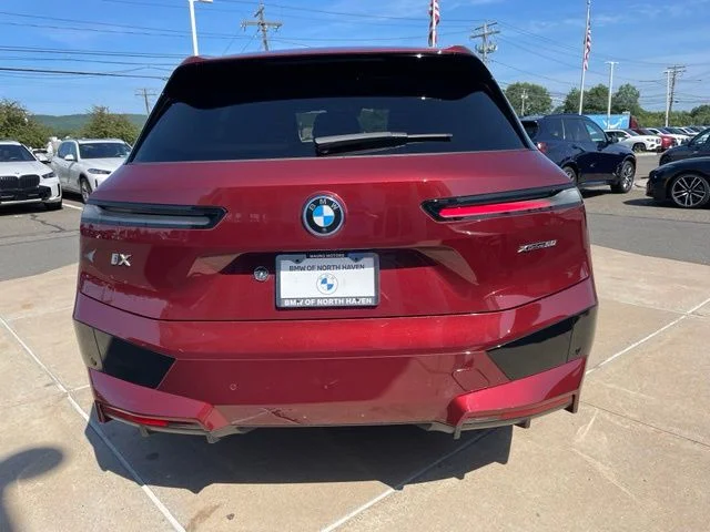 Certified Used 2024 Red BMW xDrive50 image 10