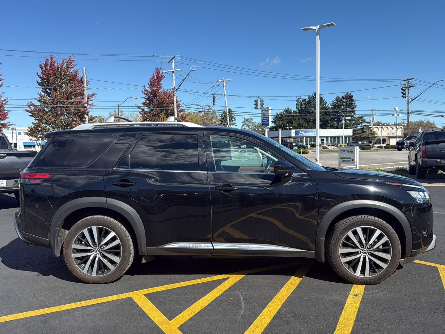Used 2024 Super Black Nissan Platinum image 2