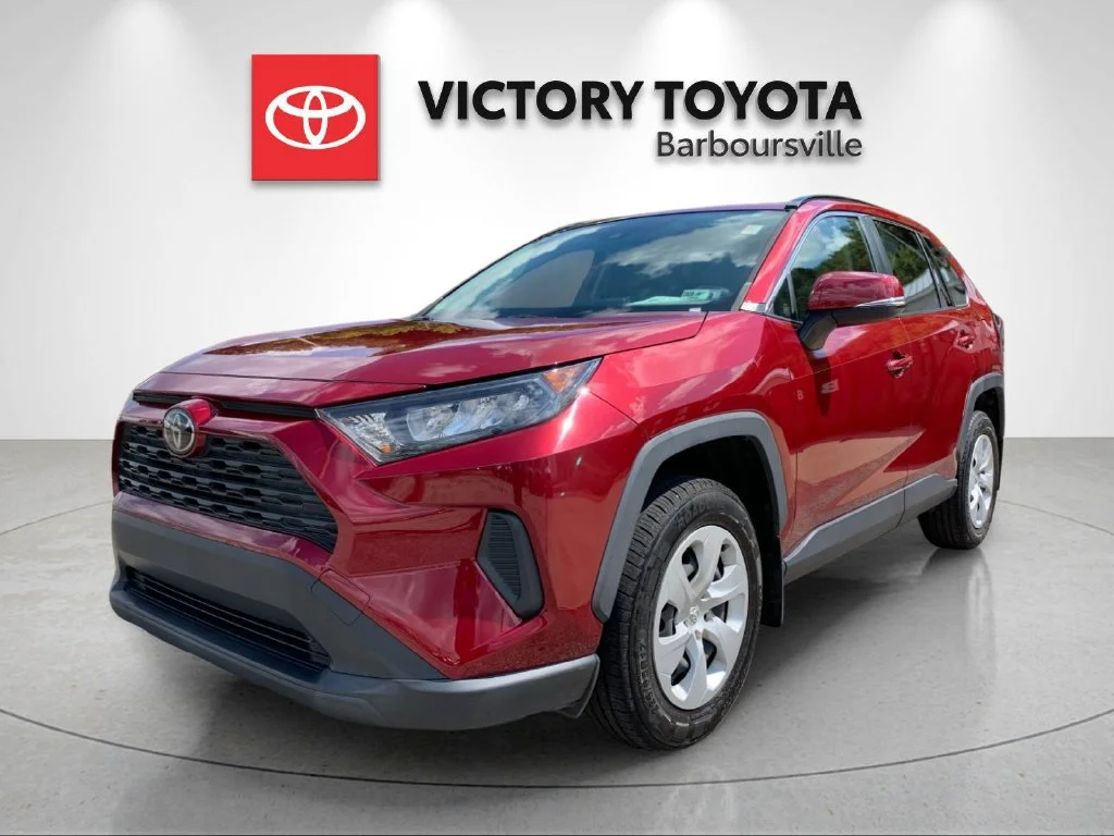 Used 2021 Red Toyota LE image 1