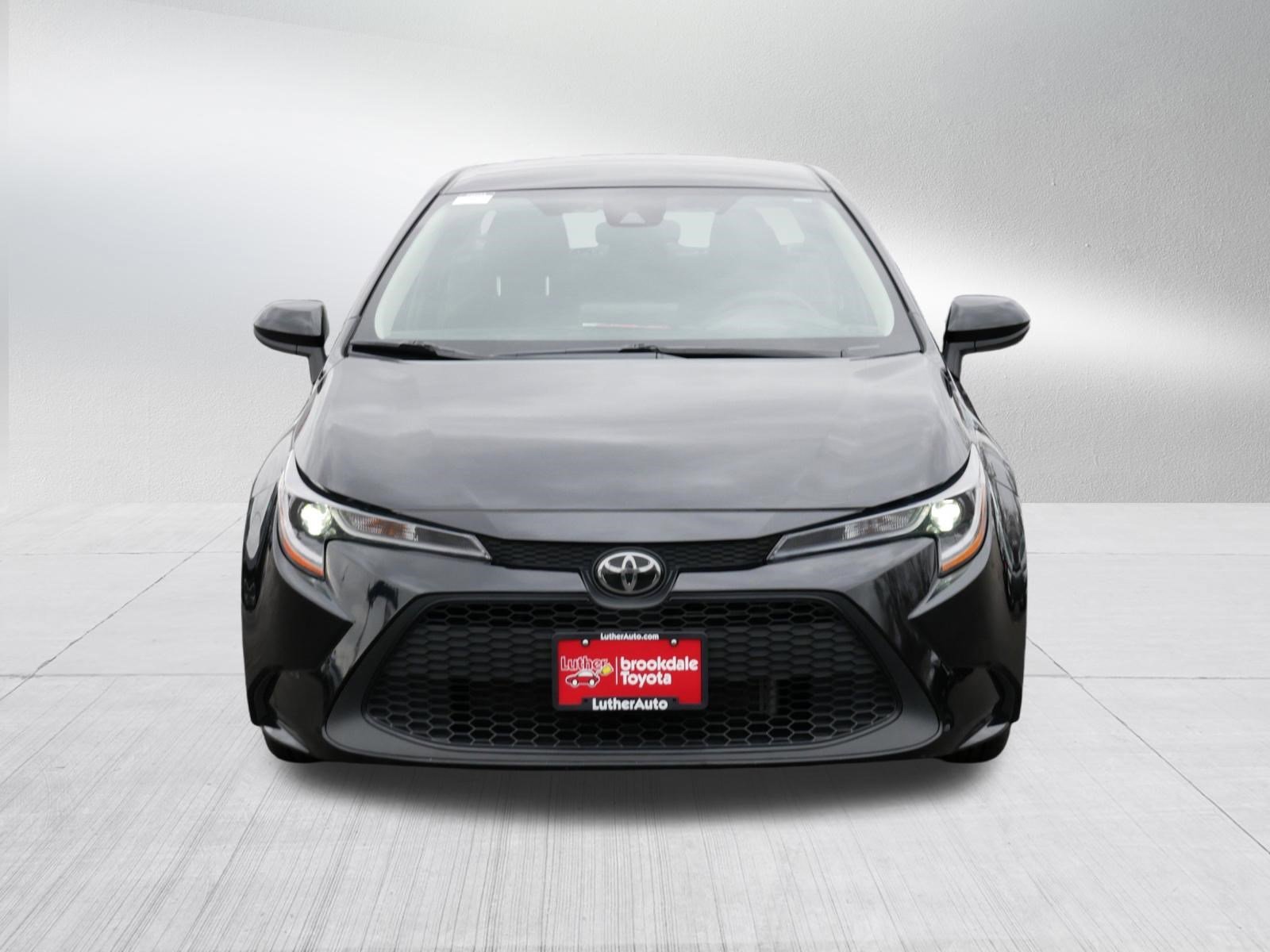 Used 2022 Toyota Corolla LE with VIN JTDEPMAE4NJ221279 for sale in Brooklyn Center, Minnesota