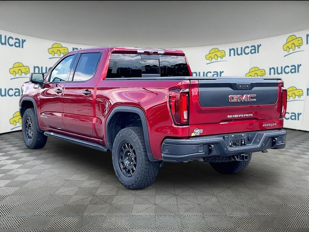 Used 2023 Volcanic Red Tintcoat GMC AT4X image 4