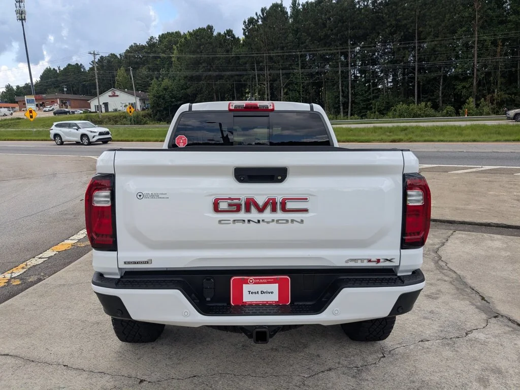 Used 2023 Summit White GMC 4WD AT4X image 6