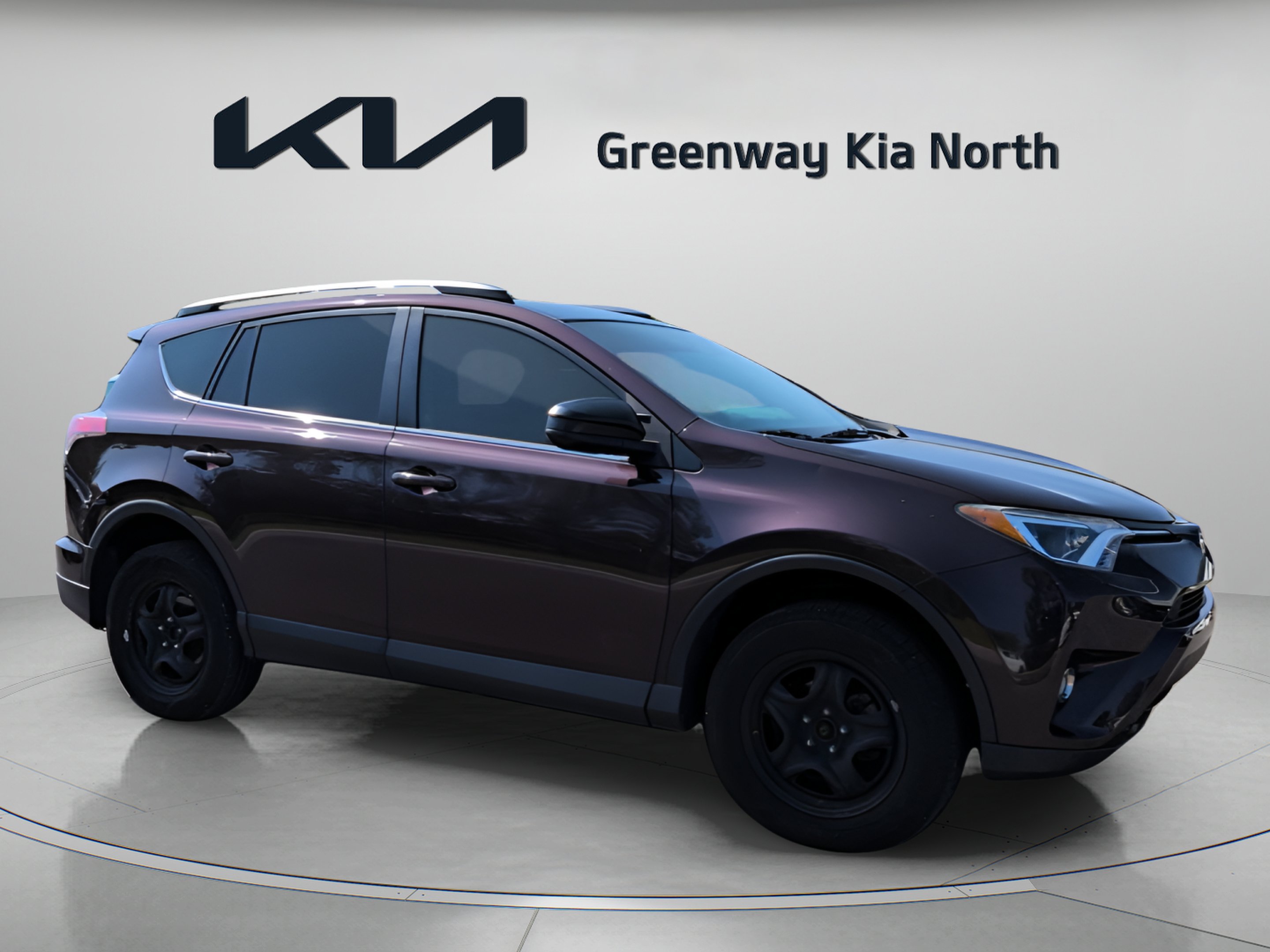 Used 2018 Black Currant Toyota LE image 2