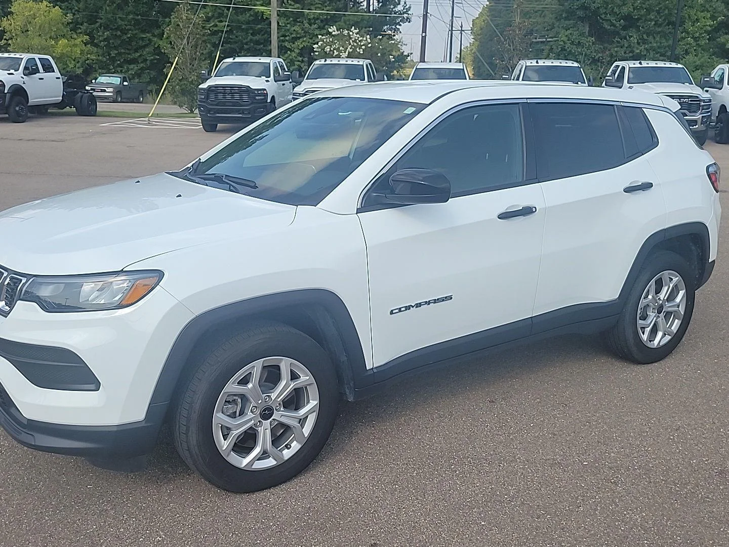 Used 2025 Bright White Clearcoat Jeep Sport image 1
