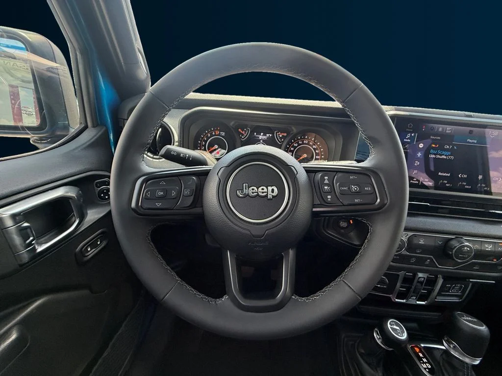 New 2026 Blue Jeep Sport S image 13