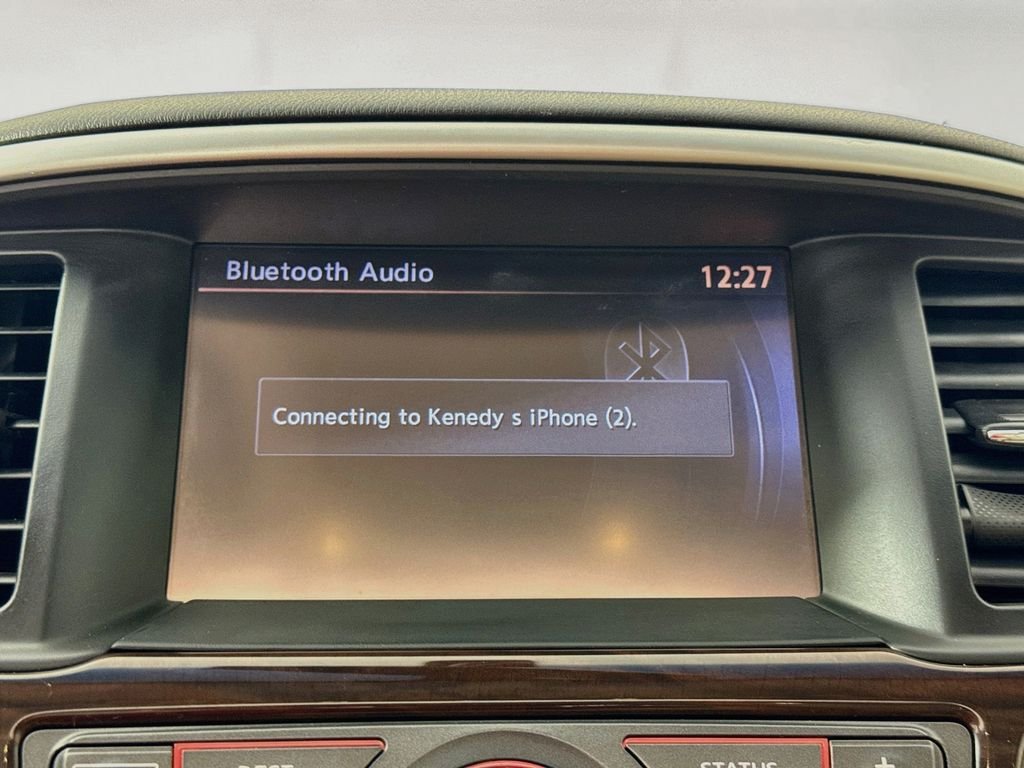 Used 2016 Pearl White Nissan Platinum image 19