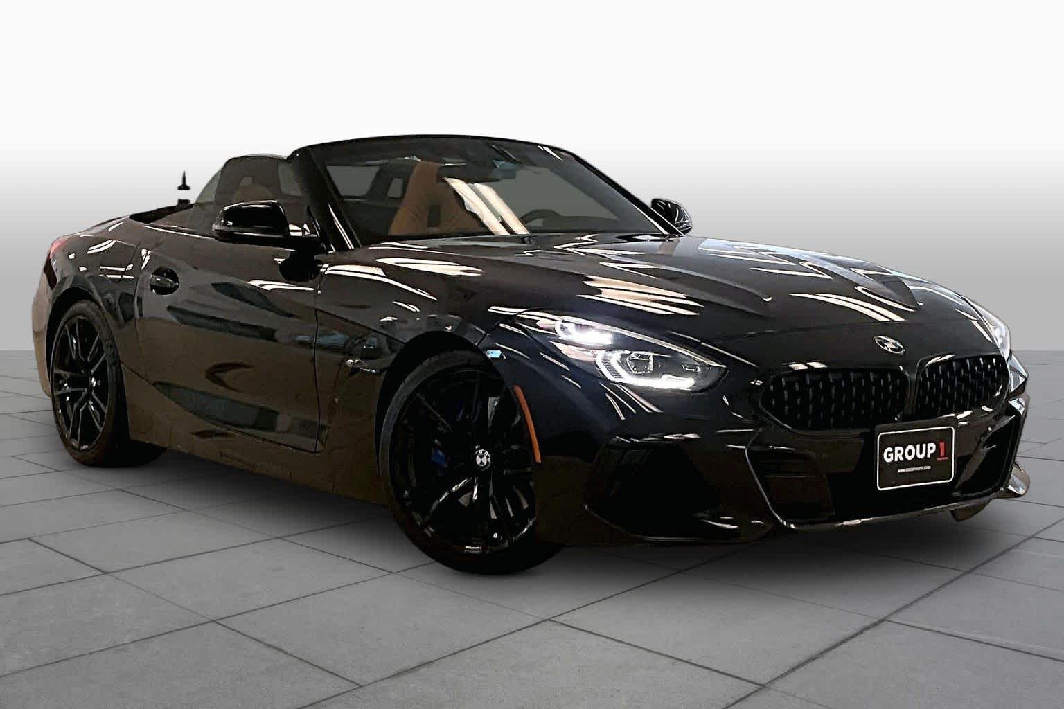 Used 2022 Black Sapphire Metallic BMW sDriveM40i image 2