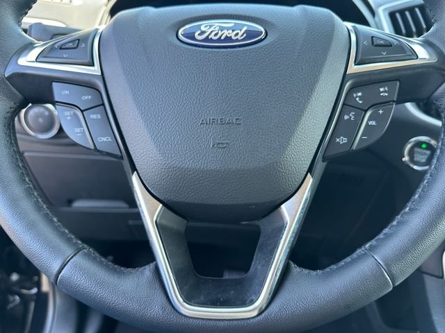 Used 2024 Agate Black Metallic Ford SEL image 32