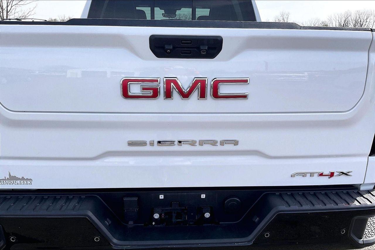Used 2024 Summit White GMC 4WD Crew Cab Short Box AT4X image 27