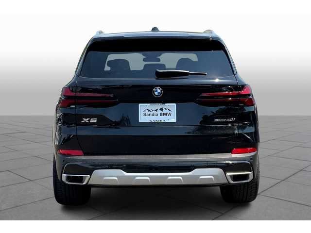 New 2026 Black Sapphire Metallic BMW sDrive40i image 4