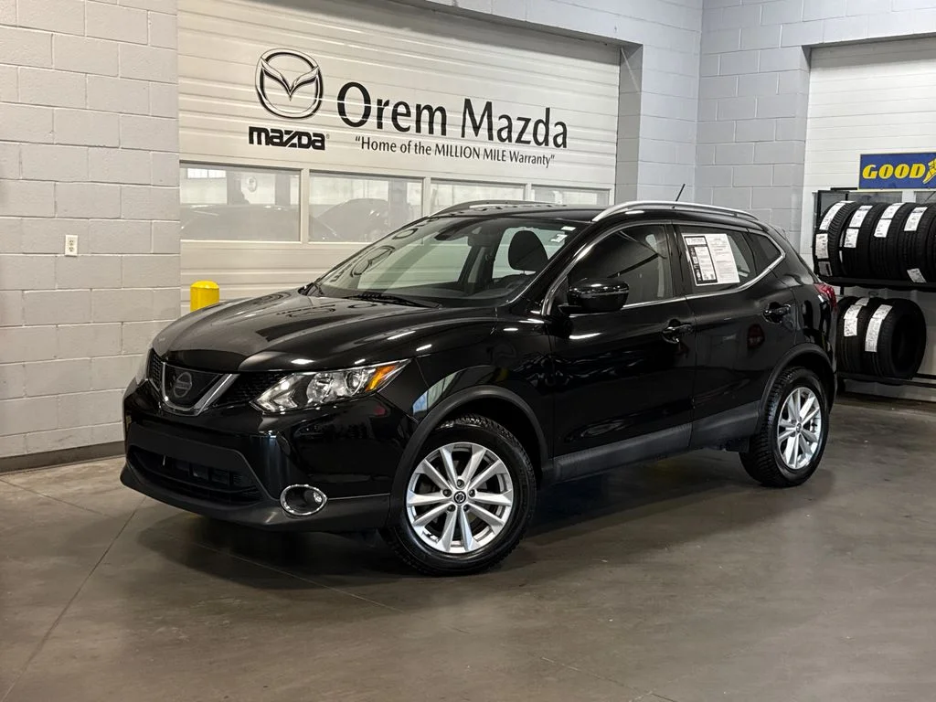 Used 2019 Black Nissan SV image 1