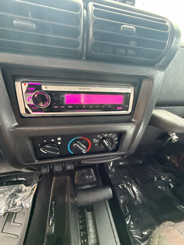 Used 2000 Orange Jeep Sport image 20