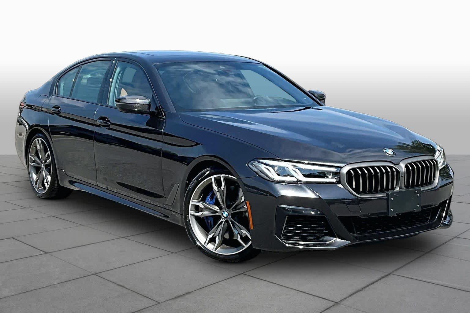 Certified Used 2023 Dark Graphite Metallic BMW M550i xDrive image 2
