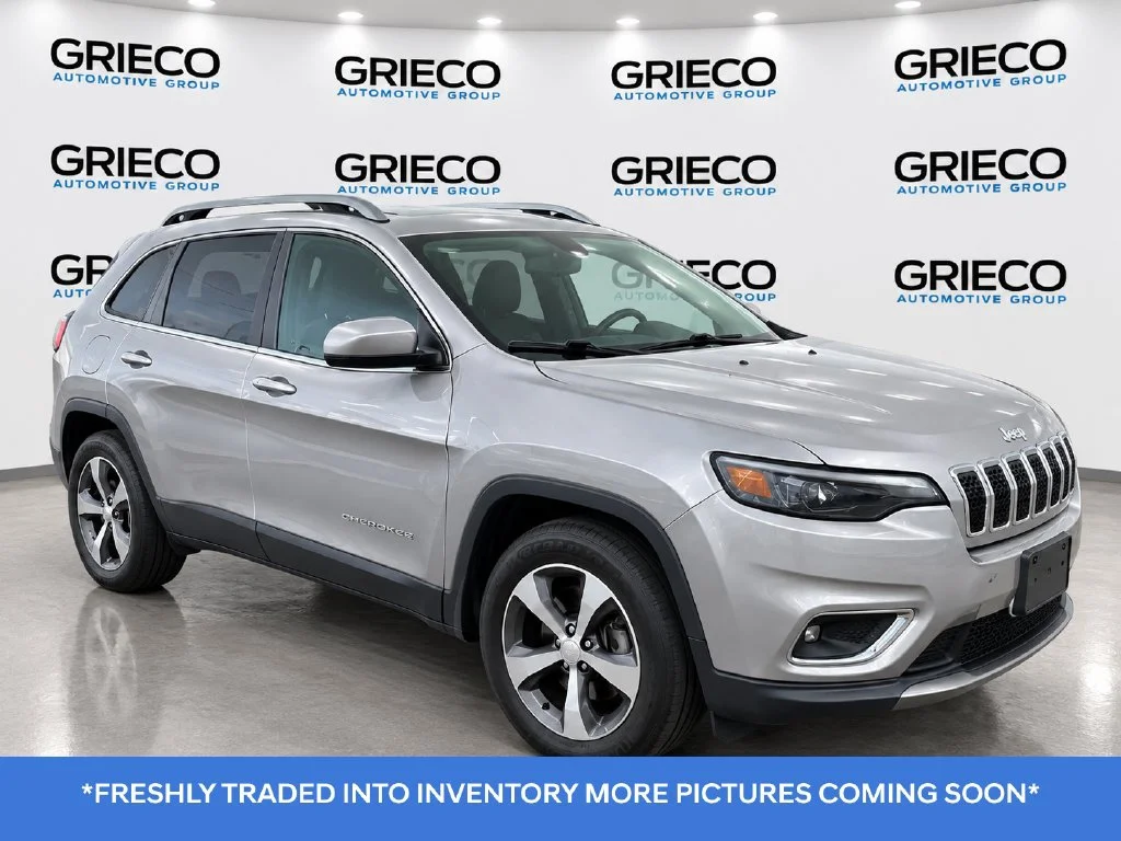 Used 2019 Billet Silver Metallic Jeep Limited image 1