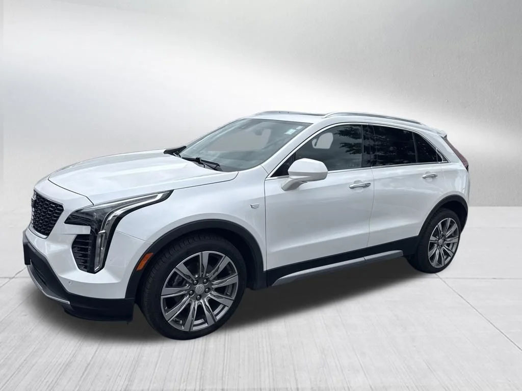 Used 2019 White Cadillac Premium Luxury image 1