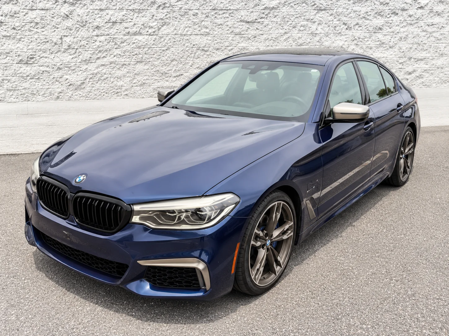 Used 2019 Blue Metallic BMW M550i xDrive image 1