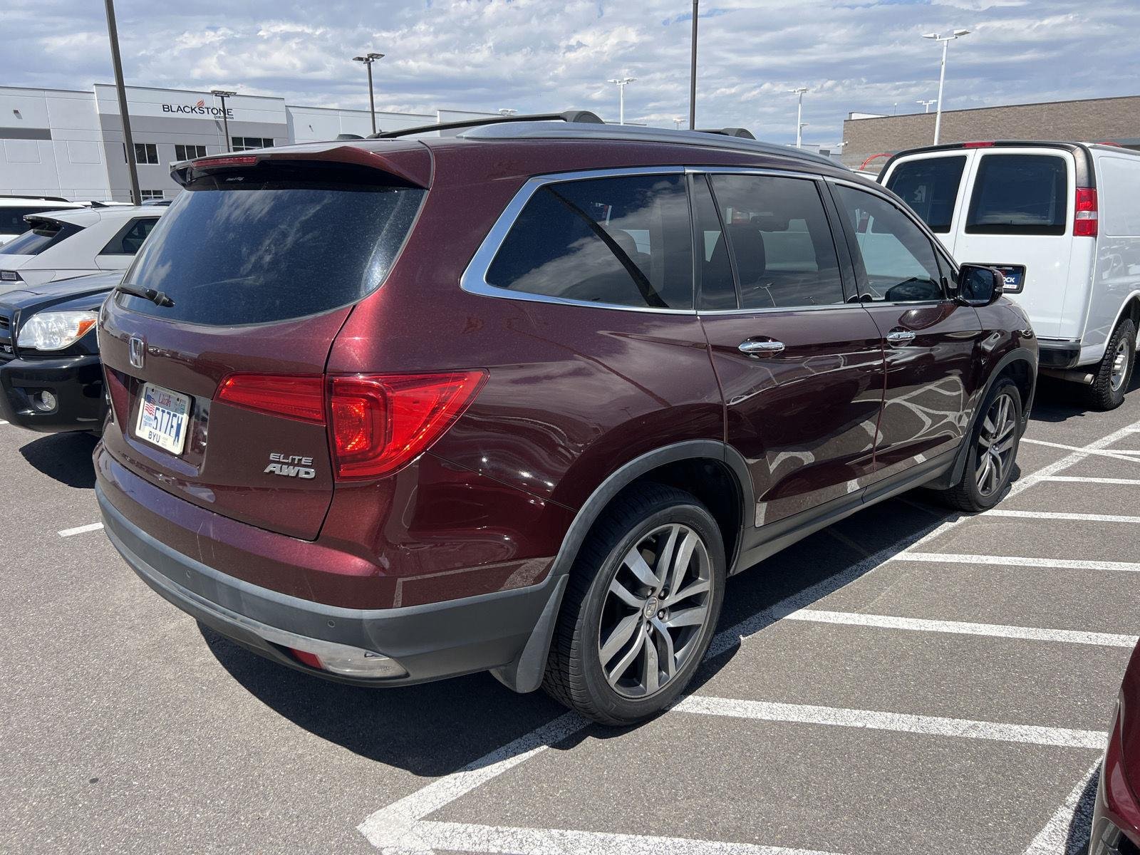 Used 2018 Deep Scarlet Pearl Honda Elite image 3
