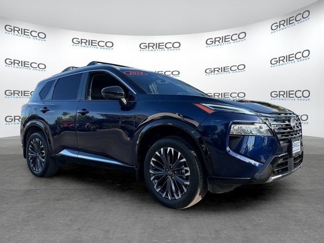Used 2024 Blue Nissan Platinum image 1