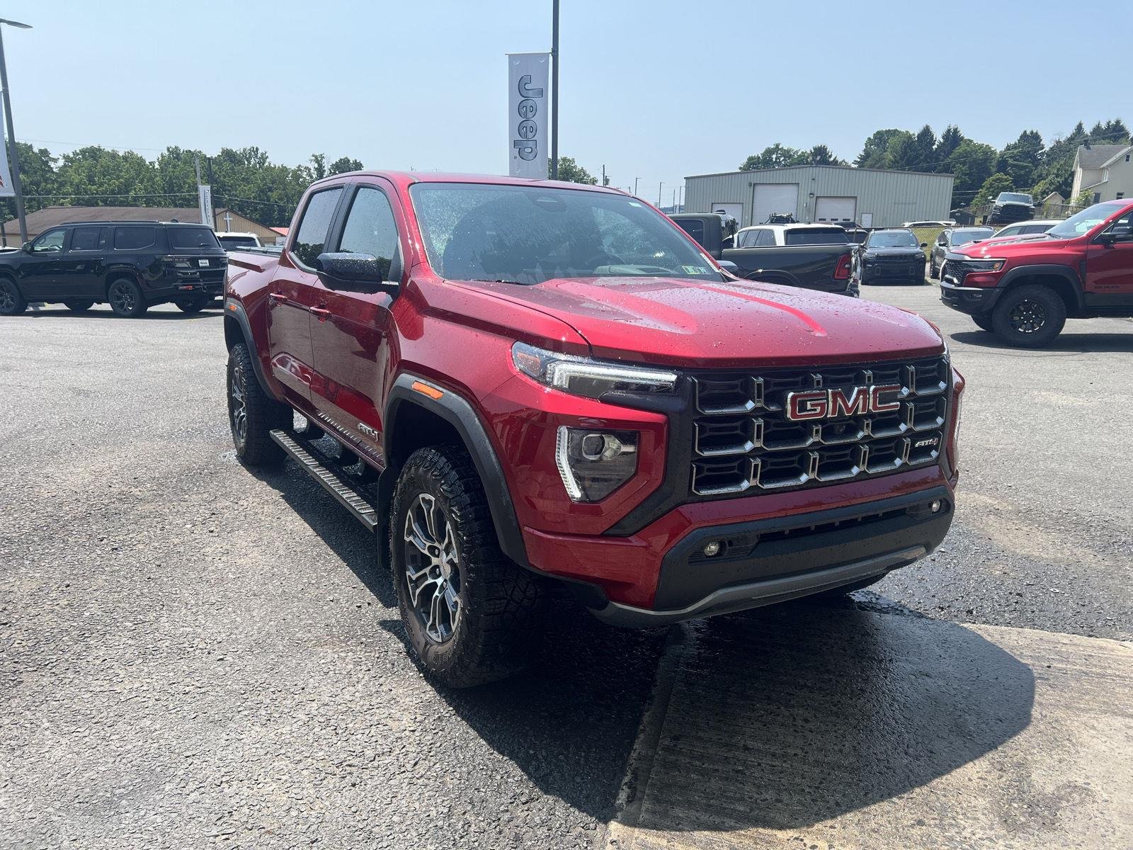Used 2024 Volcanic Red Tintcoat GMC 4WD AT4 image 15