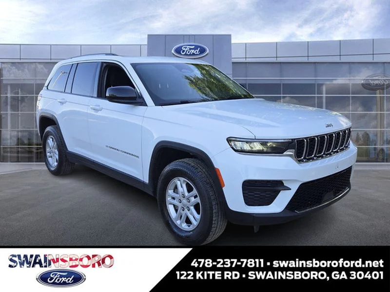 Used 2023 Bright White Clearcoat Jeep Laredo image 1