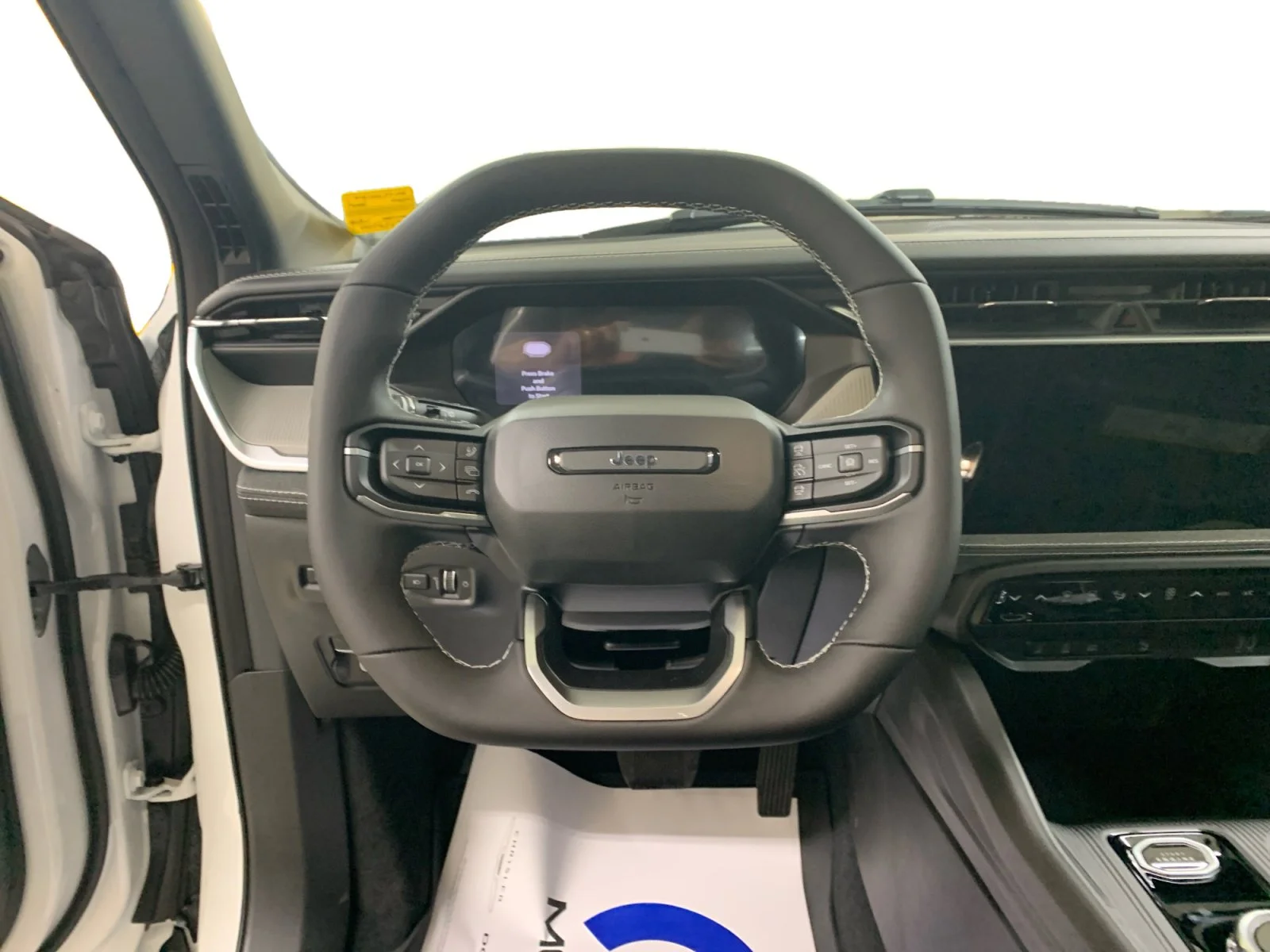 New 2026 Bright White Jeep Laredo image 13