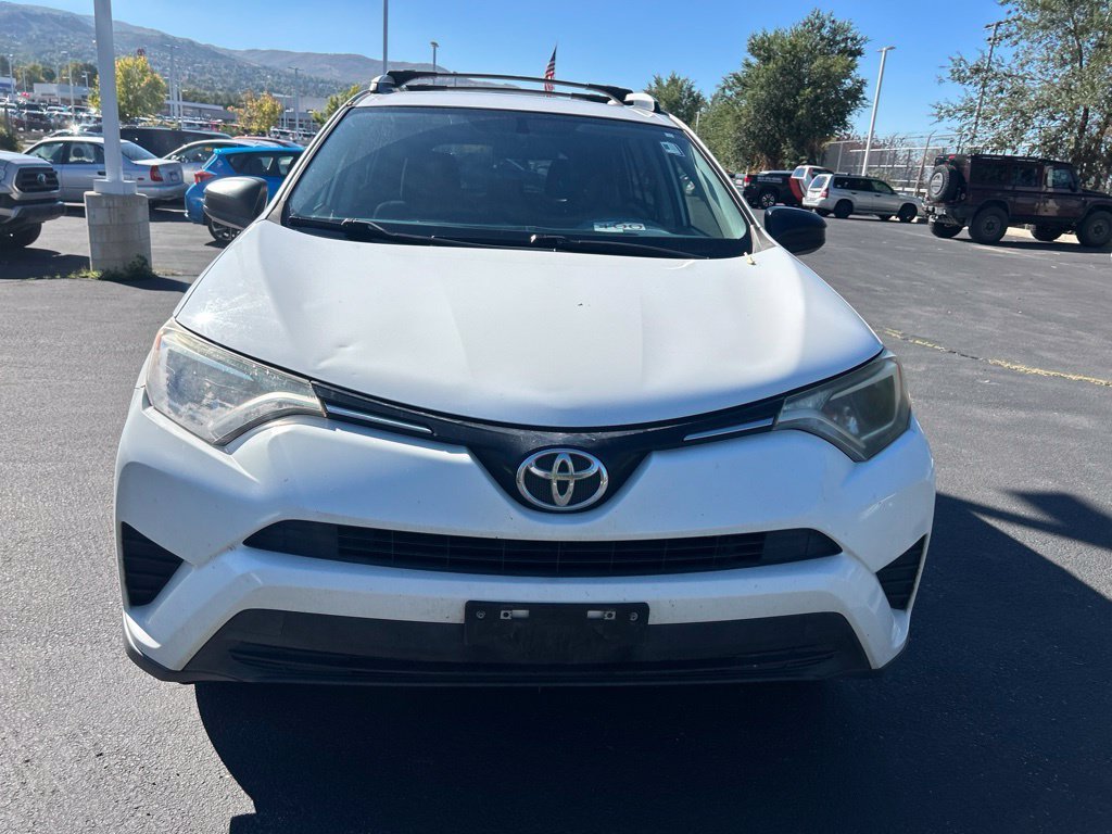 Used 2016 Super White Toyota LE image 4