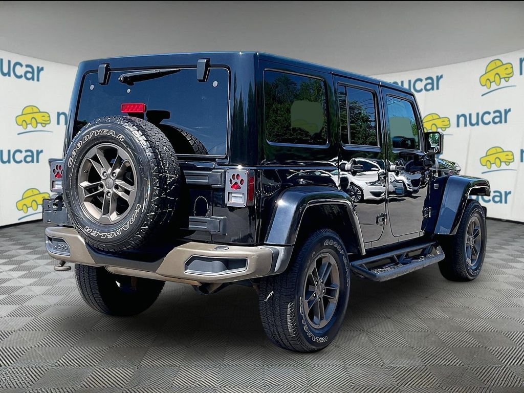 Used 2017 Black Jeep Unlimited Sahara image 6