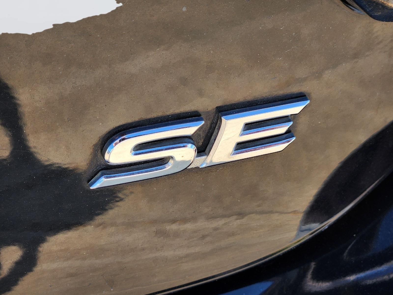 Used 2016 Midnight Black Metallic Toyota SE image 11