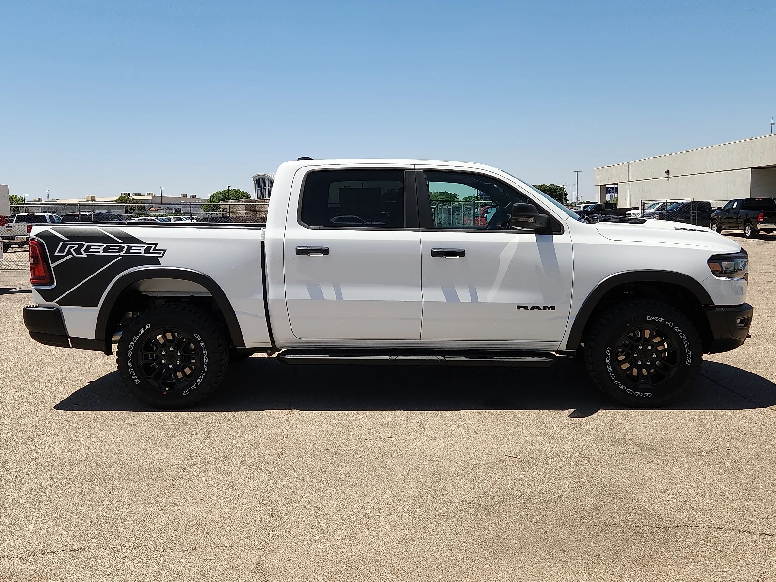 New 2026 Bright White Clear-Coat  Paint Ram REBEL CREW CAB 4X4 5