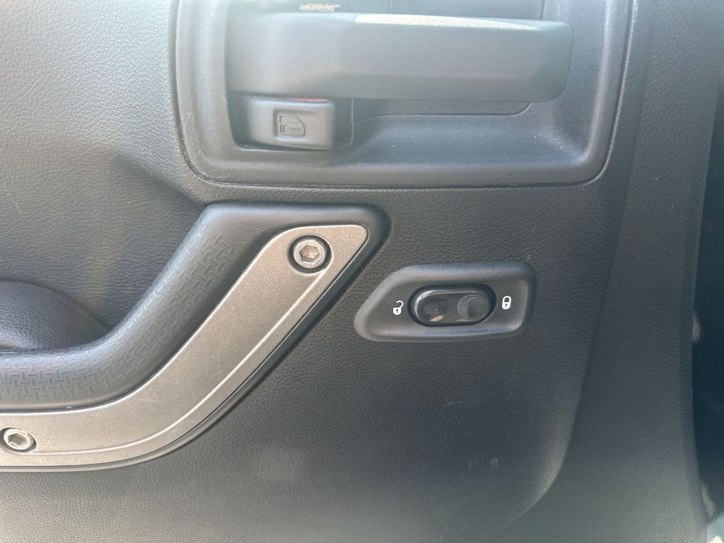 Used 2014 Black Jeep Unlimited Sport image 19