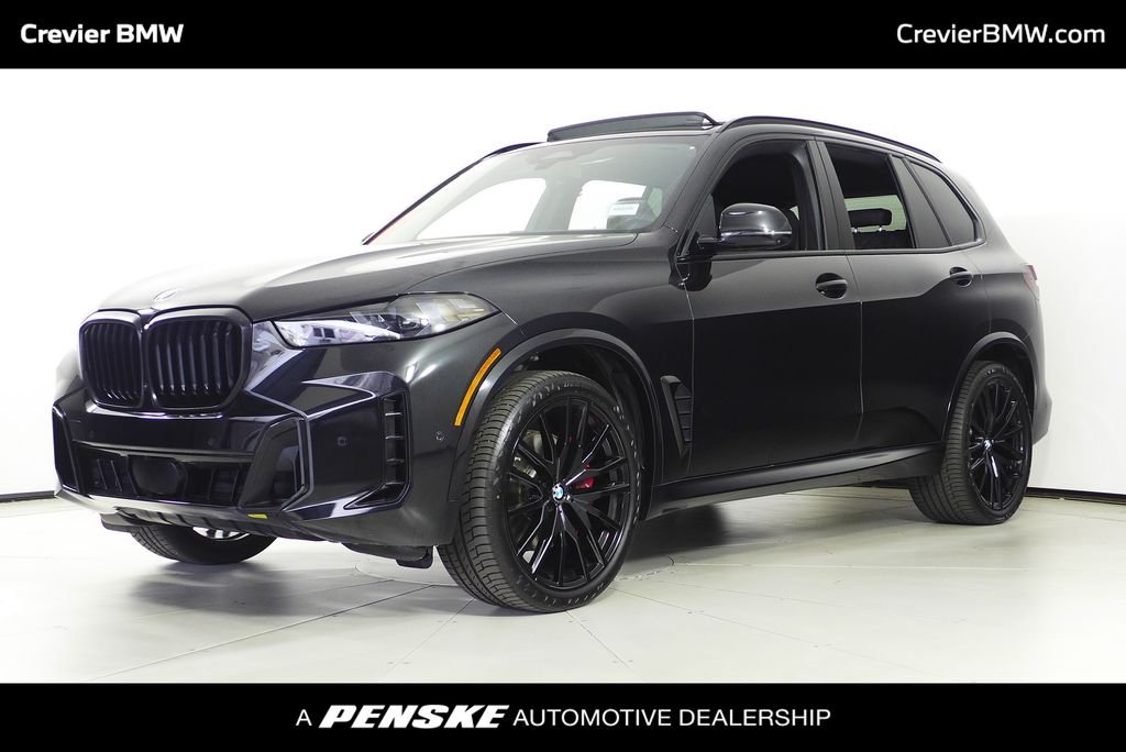 Used 2024 Black Sapphire Metallic BMW sDrive40i image 1