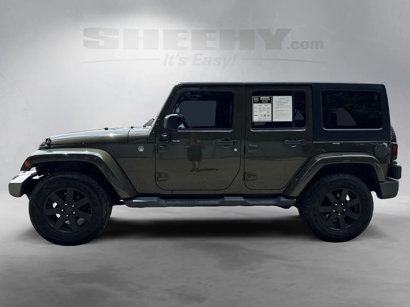 Used 2015 Green Jeep Unlimited Sahara image 13