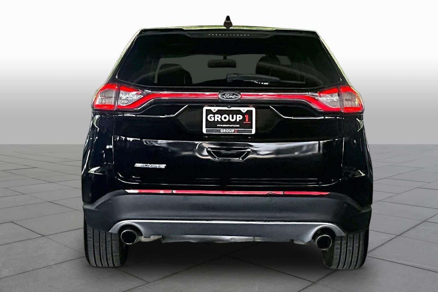 Used 2016 Shadow Black Ford Titanium image 4