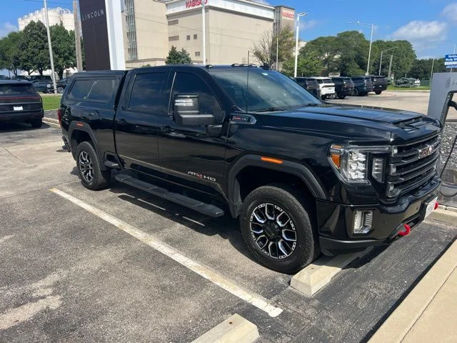 Used 2022 Ebony Twilight Metallic GMC AT4 image 1