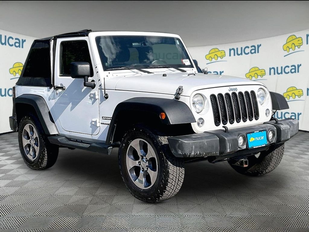 Used 2014 White Jeep Sport image 1