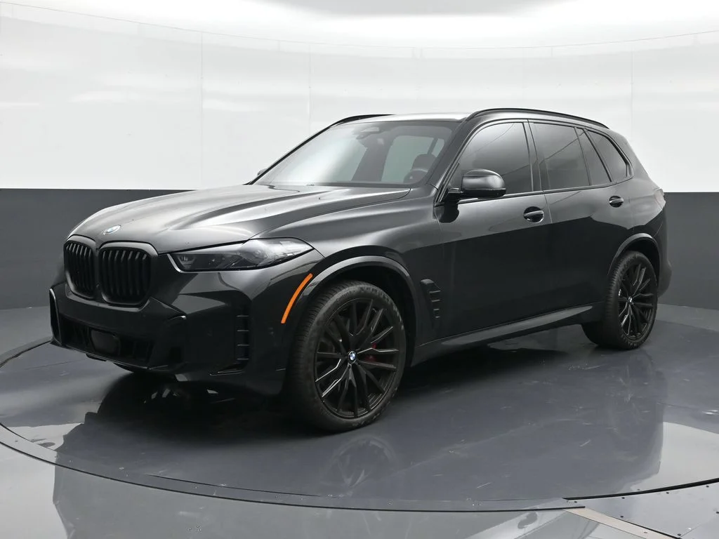 Certified Used 2025 Black Sapphire Metallic BMW sDrive40i image 1