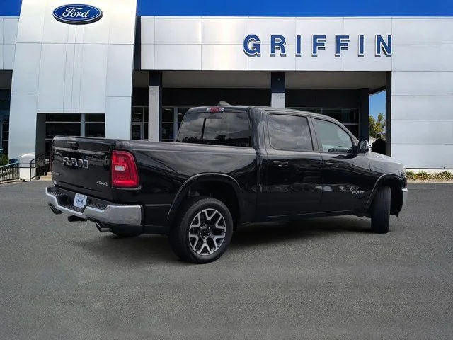 Used 2025 Diamond Black Ram Laramie image 4