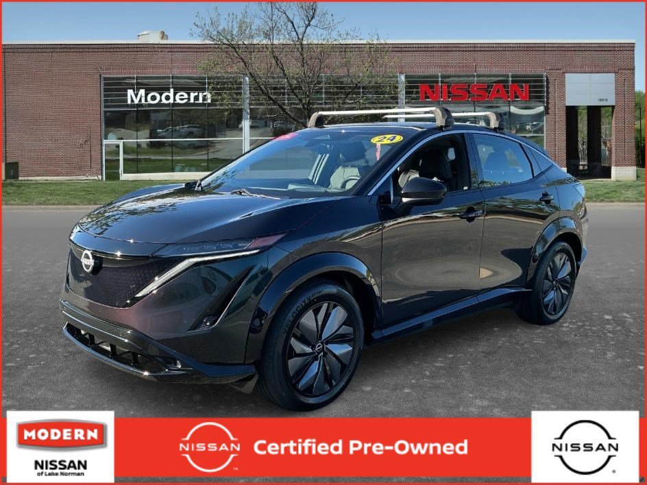 Used 2024 Northern Lights Metallic Nissan EVOLVE+ image 1