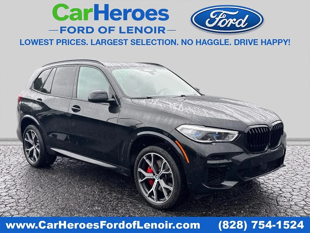 Used 2022 Black BMW sDrive40i image 1