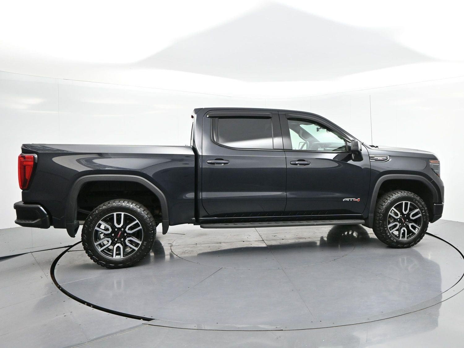 Used 2024 Titanium Rush Metallic GMC AT4 image 8