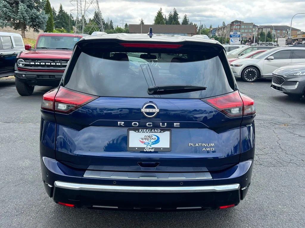 Used 2024 Deep Ocean Blue Nissan Platinum image 8
