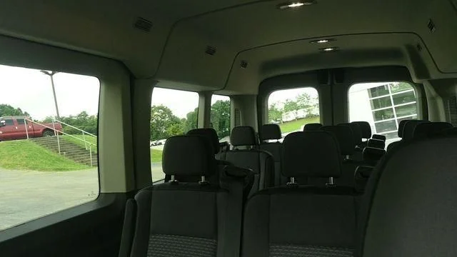 New 2026 Oxford White Ford Passenger Van XLT image 5
