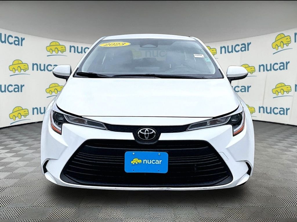 Used 2023 White Toyota LE image 2