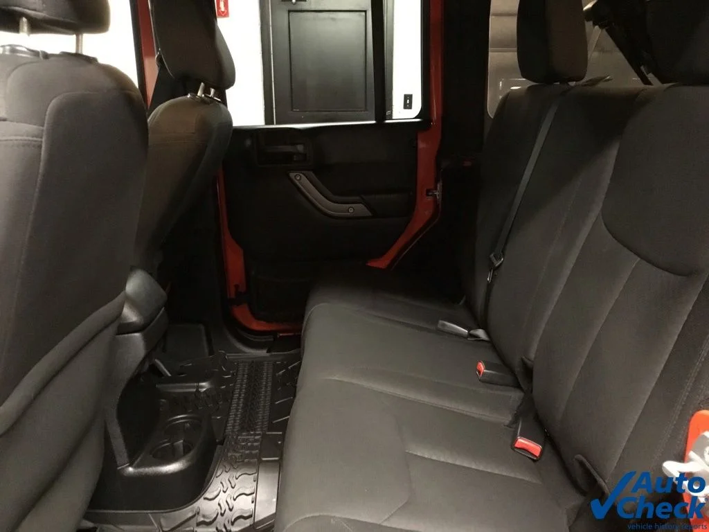 Used 2015 Orange Jeep Unlimited Sport image 31