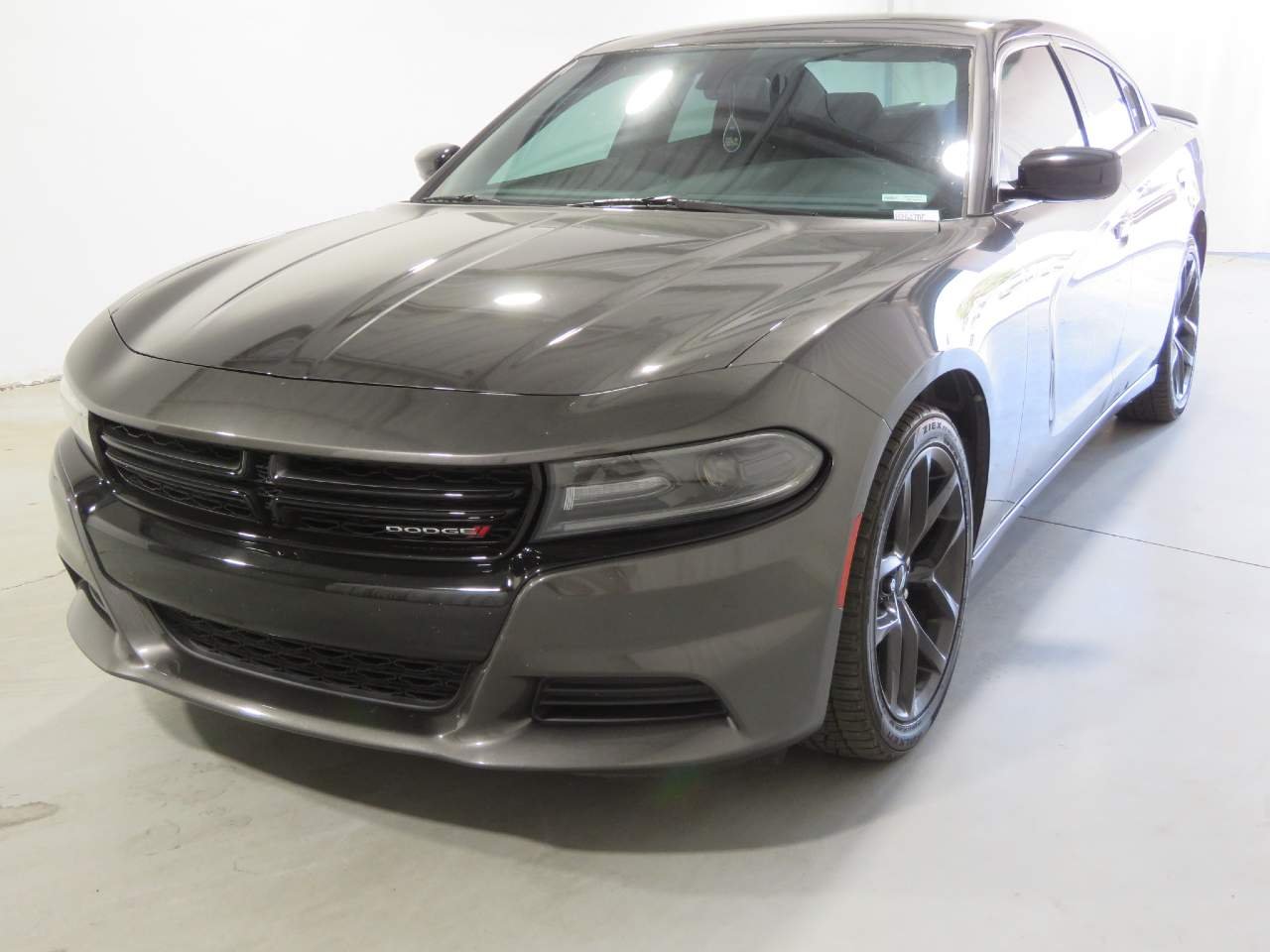 Used 2021 Granite Crystal Metallic Clear Coat Dodge SXT image 1
