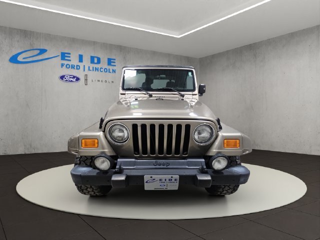 Used 2004 Beige Jeep Sport image 7