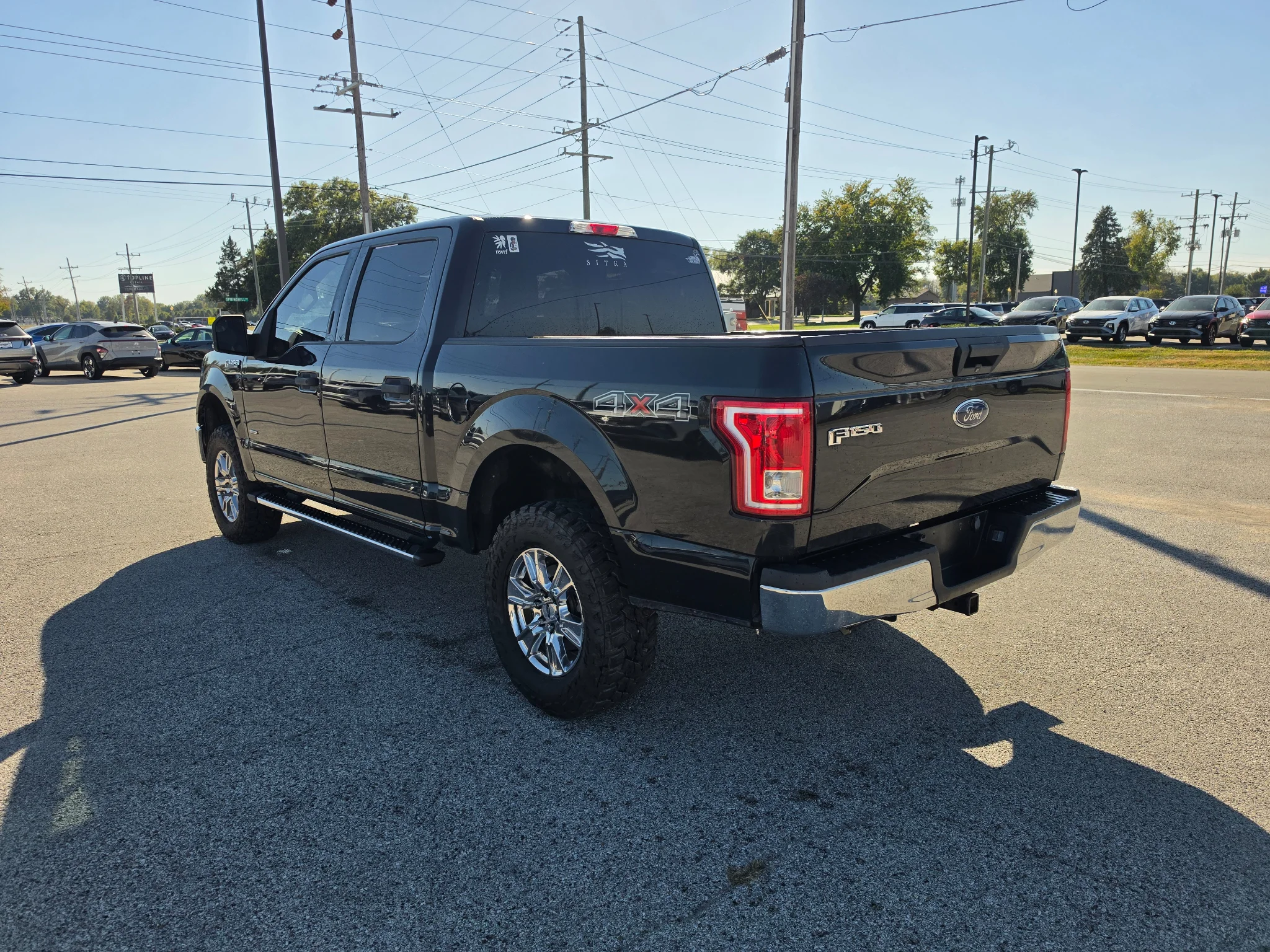 Used 2015 Tuxedo Black Metallic Ford XLT image 4