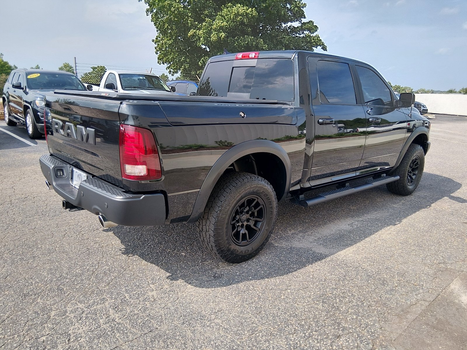 Used 2017 Brilliant Black Crystal Pearl Coat Ram 4x4 Rebel 4dr Crew Cab 5.5 ft. SB Pickup image 3